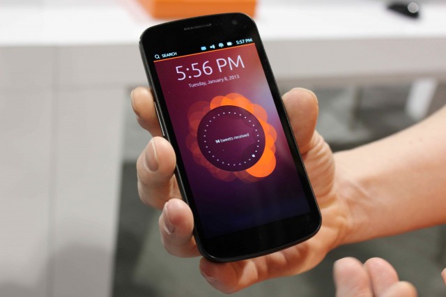 Canonical's Richard Collins holds a Galaxy Nexus running the Ubuntu phone interface.