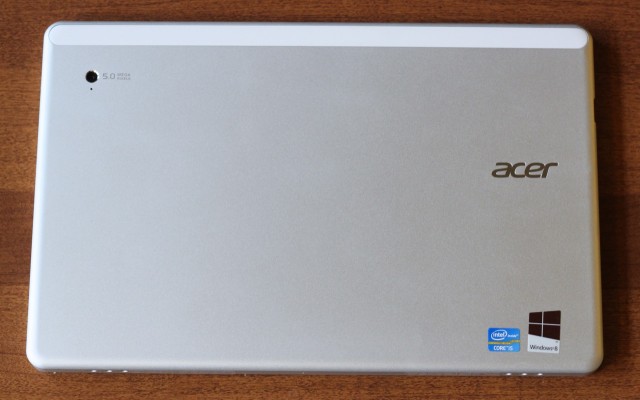 The back of the tablet is flat with slightly rounded edges.