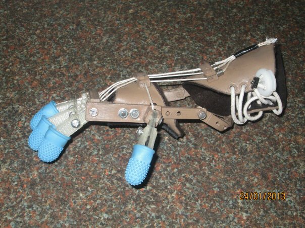 Liam's Robohand, the product of a collaboration between Ivan Owen in Bellingham, Washington and Richard Van As in South Africa—and produced on a MakerBot 3D printer.