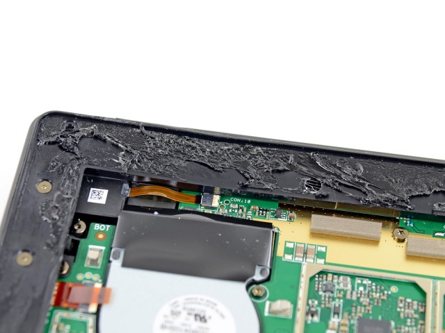 Tar-like glue keeps the Surface Pro securely stuck together.