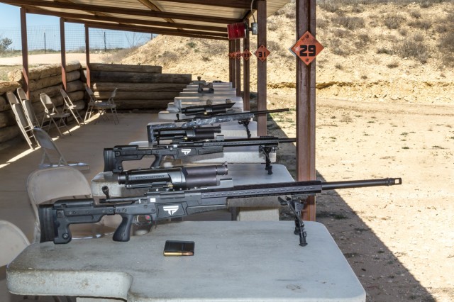 All three PGFs. Foreground is the .338 LM XS1, middle is the .300 WinMag XS2, and rear is the .300 WinMag XS3. .338LM magazine and cartridges are also shown in foreground.