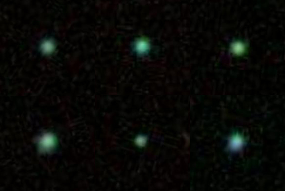 Six of the Green Pea galaxies found in galaxy survey data by citizen scientists. These galaxies may resemble forms in the early Universe, which produced the radiation that ionized much of the gas in the cosmos.