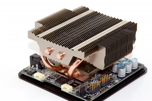 Close-up of the ASIC's heat sink and some of the motherboard components.