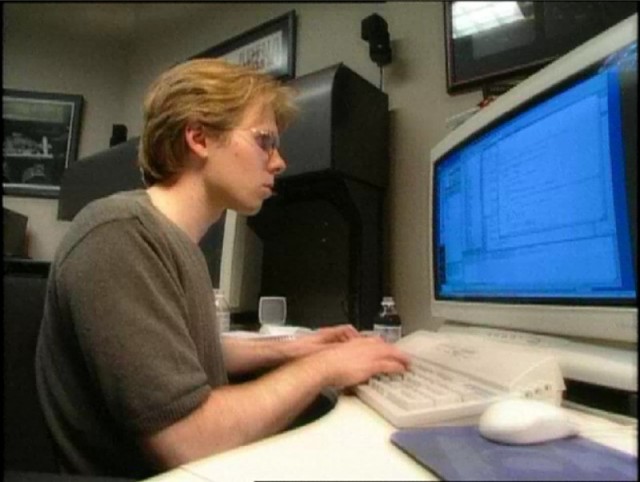 A young Carmack hard at work writing code, long before he was accused of stealing illicit copies of his own work.