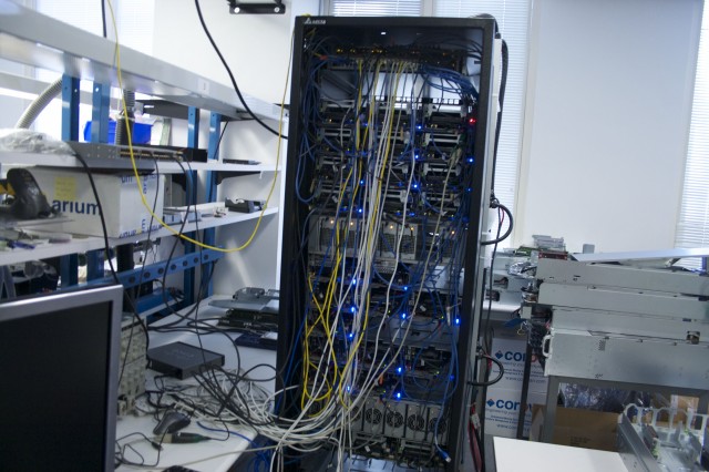 A test rack in Facebook's hardware electrical test lab filled with Facebook DIY hardware.