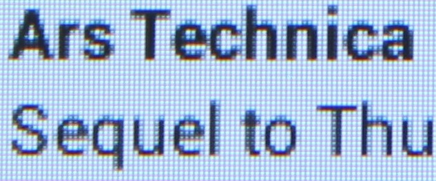 Let's look at the screen of our rooted 2011 Kindle Fire, which has the same size and pixel density as the Sero 7 Lite. This is a zoomed-in picture of the Twitter app at max brightness—look at the L in "sequel" and note that it's made with one vertical line of black pixels and one vertical line of grey pixels. Also note the T in "to," most of which is made from two columns of almost-black pixels.