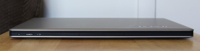 The laptop's power button is on the front edge, an odd placement decision.