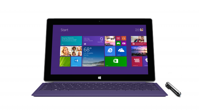 Surface Pro 2 with a purple Type Cover 2. Surface Pro 2 retains the digitizer and pen support of the first generation device.