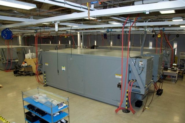 Data center in a box: Electronic Modular Enclosures being configured at Raytheon's Portsmouth, Rhode Island, facility.