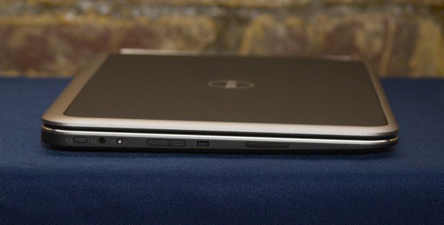 The left edge of the laptop houses a screen orientation lock button, the power slider, and a volume rocker, all of which are convenient when using the device in tablet mode.