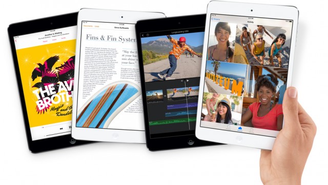 A handful of iPad minis with retina display, in silver and space gray. 