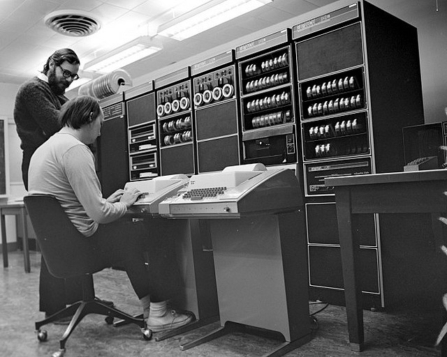 Dennis Ritchie and Ken Thompson, creators of UNIX and C, with a PDP-11/20.