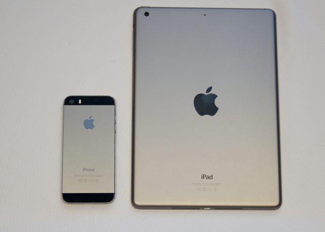 Our iPad Air (right) is the black fronted, "space gray" backed version, but it also comes in white and silver. The black color used in the iPhone 5 and first-generation iPad mini has been tossed out, possibly to reduce the visibility of scratches and chips.