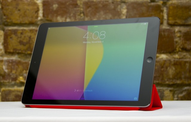 The iPad Air propped up by its new Smart Cover.