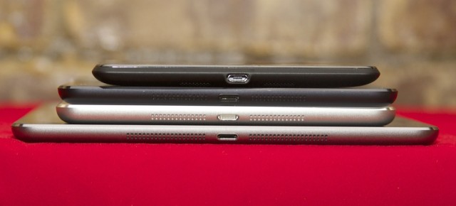 From bottom to top: the iPad Air, the Retina iPad mini, the standard iPad mini, and the 2013 Nexus 7. All very thin tablets.