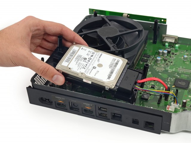 The hard disk drive and the Blu-ray drive are both attached with standard SATA connectors.