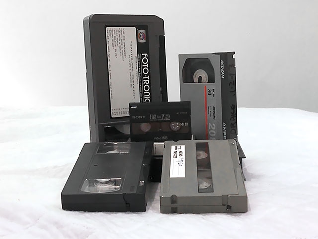 Five different videotape formats, with a U-Matic cassette at top left.