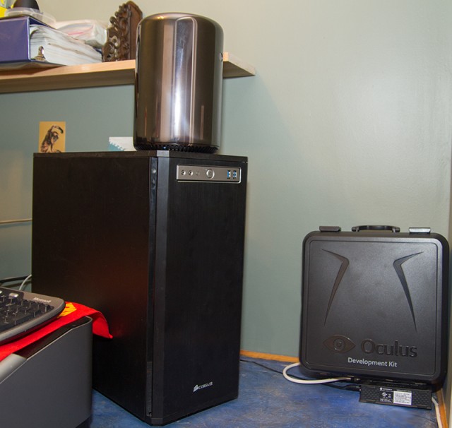 <br />
My Linux machine next to the 2013 Mac Pro. My 550D's truly epic amount of empty drive bays (and nasty wire layout) is advertising enough for the new Mac Pro's design philosophy: only take up space that you actually need to.
