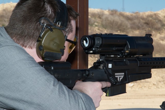 The author on the range with one of TrackingPoint's original bolt-action rifles in 2013.