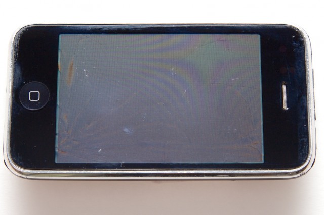 At first, the screen protector appeared to have kept the iPhone's screen from harm. However, When viewed at an angle with more light, cracks in the actual LCD screen beneath the glass became apparent. Still <em>I ran over it with a car</em>. A screen protector's not going to help much with that.