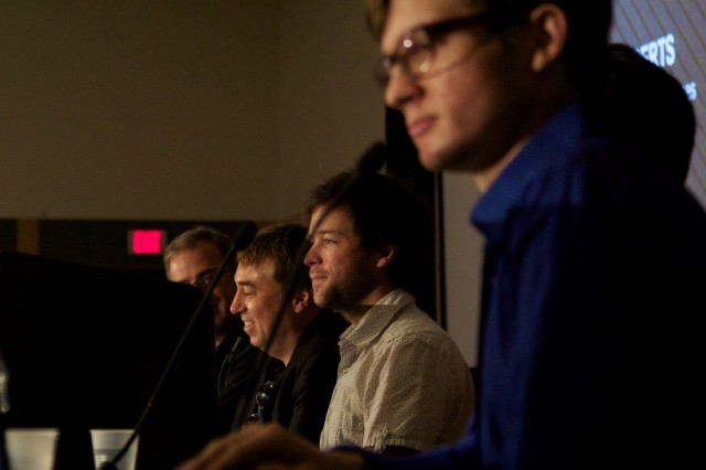 From left to right—Tom Petersen, Chris Roberts, Matt Higby, and panel moderator Evan Lahti (US editor-in-chief of <em>PC Gamer</em>). Palmer Luckey isn't pictured because he's behind Lahti.