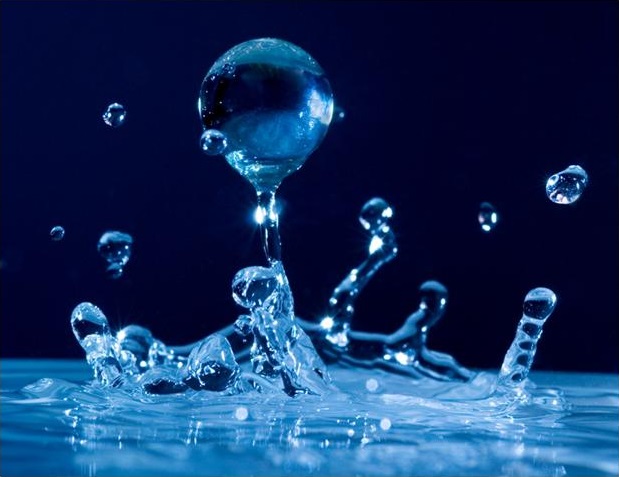 Water Drops On A Blue Glass Water-repellent Surface After The Rain