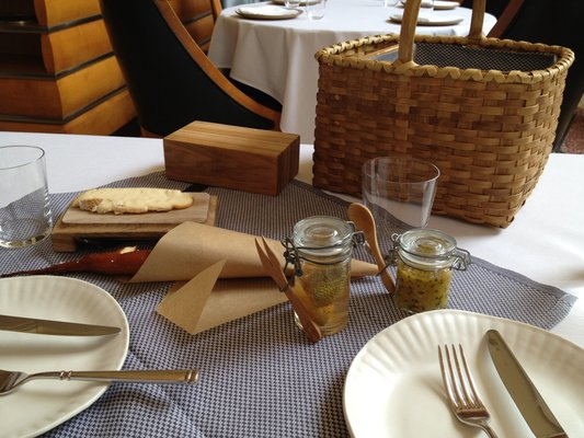 A tabletop at Eleven Madison Park, a restaurant that goes above and beyond online for its customers. 