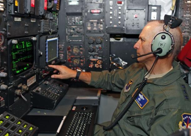 A 2012 photo of then Lt. Gen. Jim Kowalski running a prototype of the Combat Network Communications Technology (CONECT) program aboard a B-52H Stratofortress test bomber at Edwards Air Force Base. Note the old-school display of the legacy system.