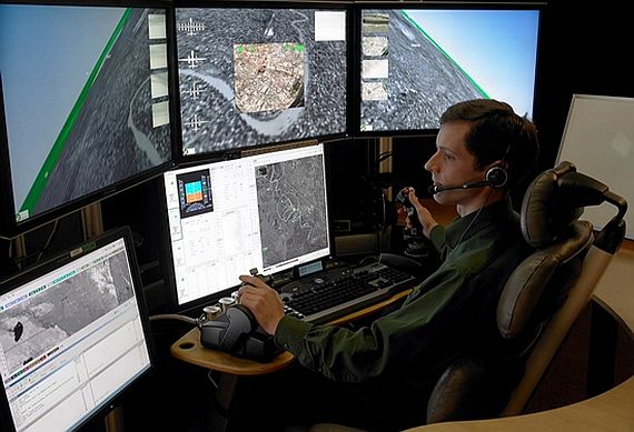 A Fire Scout pilot at the VTUAV TCS control console.