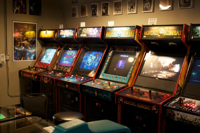 An array of <i>Mortal Kombat</i> cabinets.