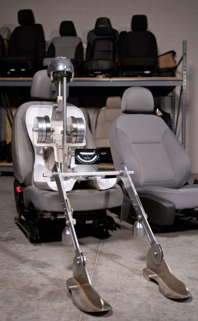 No, that's not the Terminator trying out a new car seat—it's GM's seating mannequin called Oscar.