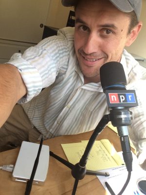 NPR's Steve Henn in his home office and studio, with the Pwnie Express PwnPlug R2 that collected his Internet traffic for a week.