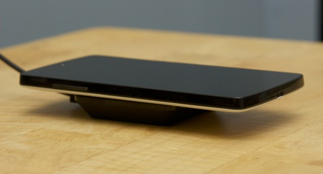 The Qi-compatible Nexus 5 on the Nexus Wireless Charger.