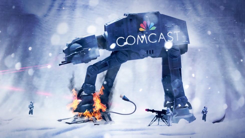 A Star Wars AT-AT battle vehicle with a Comcast logo.