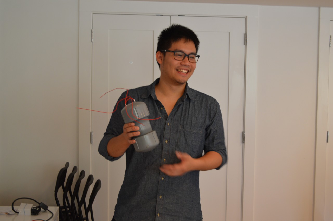 Designer Bam Suppipat showing off one of the very first Nomiku prototypes. "It looked like a pipe bomb!" he joked.