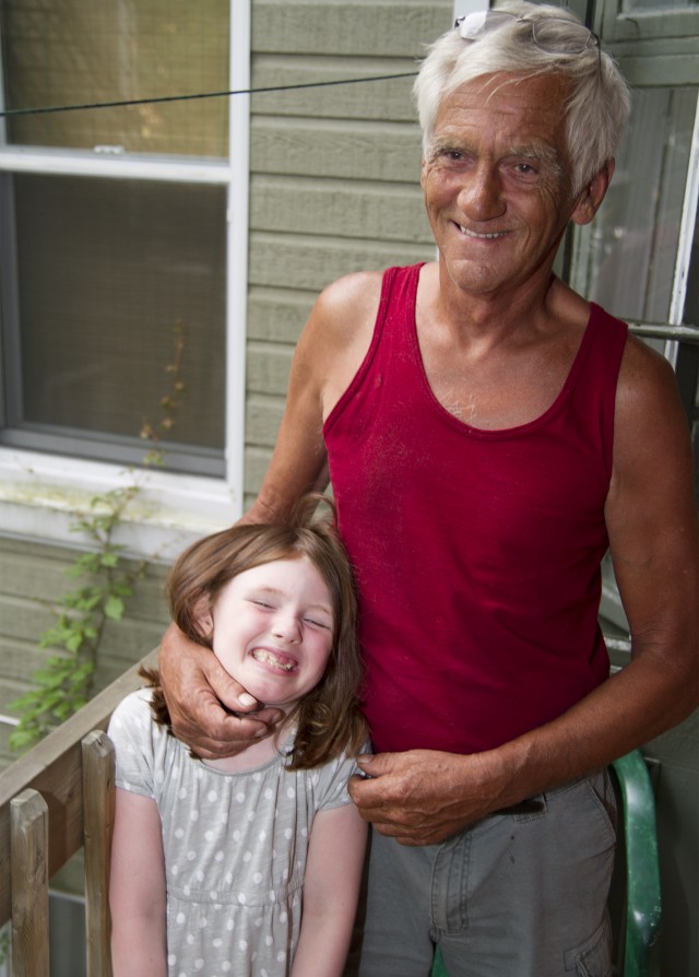 Dad’s hands holding one of his most valued treasures: his granddaughter Meah. Click any images posted here for a high-res version.