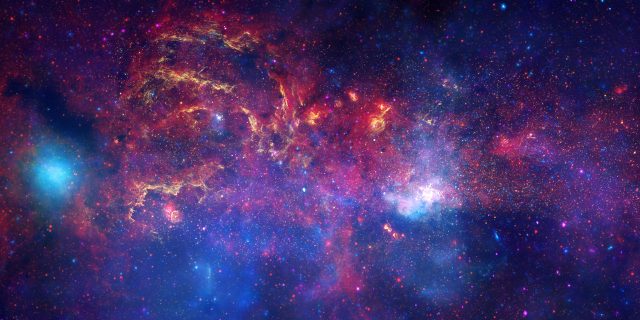 Star-forming region near the center of the Milky Way. Composite image, assembled from infrared images taken by the Hubble Space Telescope, the Spitzer Space Telescope, and the Chandra X-Ray Observatory in 2009. 