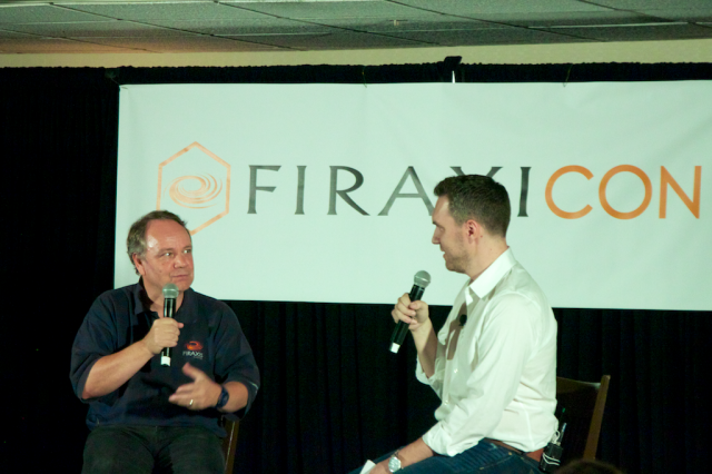 XCom designer Jake Solomon (right) talks to Meier at Firaxicon 2014.