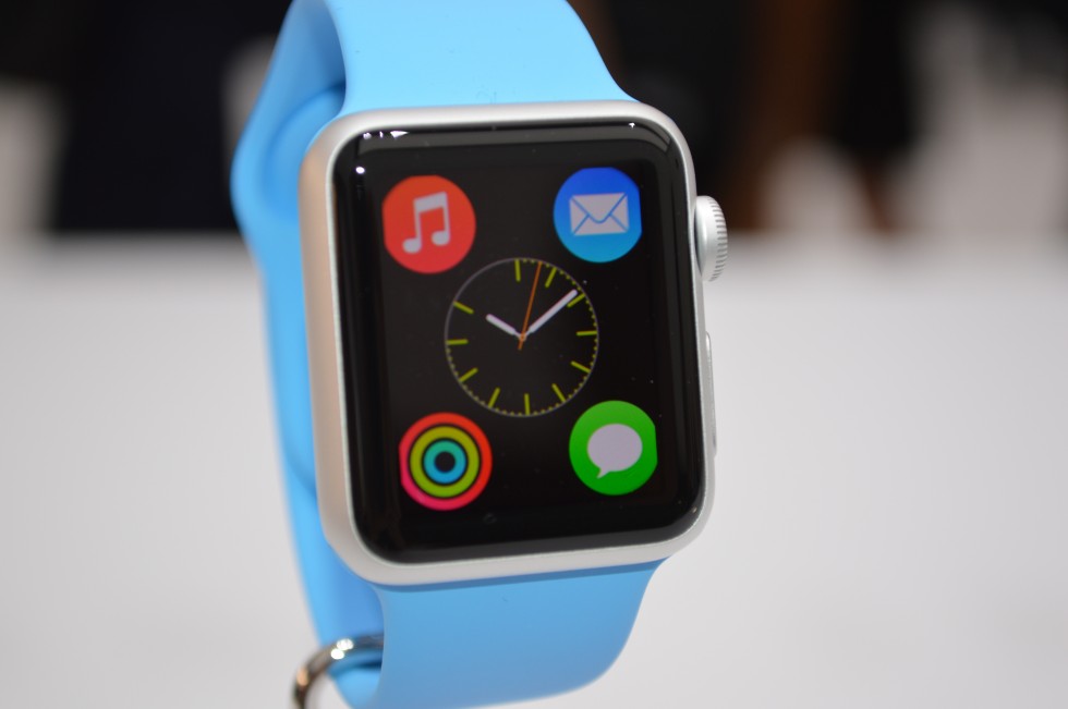 The Apple Watch Sport and its blue Sport Band.