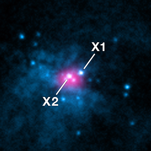 A close-up of the center of M82, as seen in the photo above, showing M82 X-1 and M82 X-2, both just barely visible in the original image.