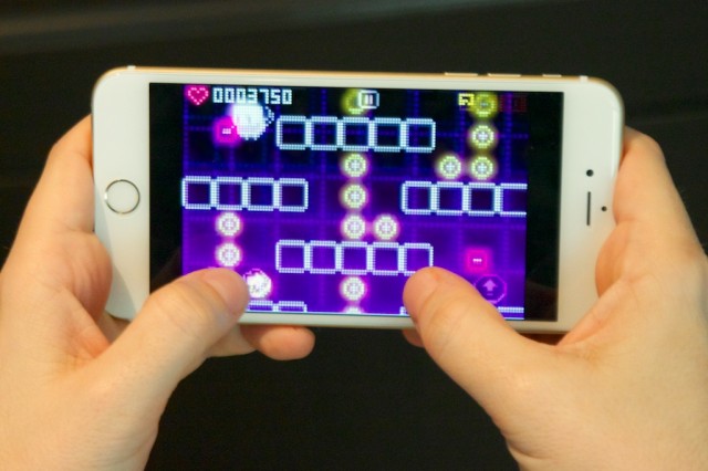 Playing <i>Pix N Love Rush</i> on the iPhone 6 Plus is nice and comfortable...