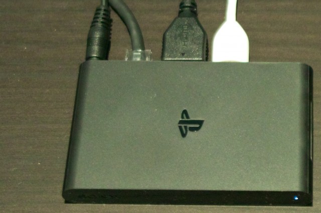 The PSTV is so small that the variety of plugs sticking out the back add appreciably to its bulk.