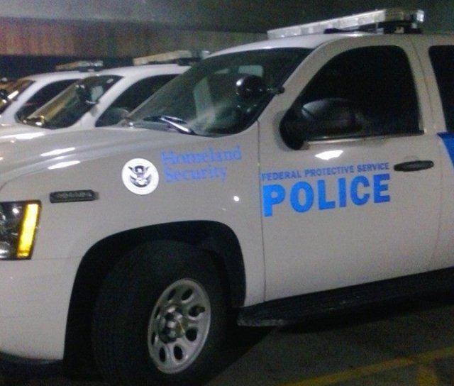 Images posted of rows of federal police vehicles in a Missouri hotel garage got the employee who took them fired—and branded as a terrorist and traitor by the hotel's security chief.
