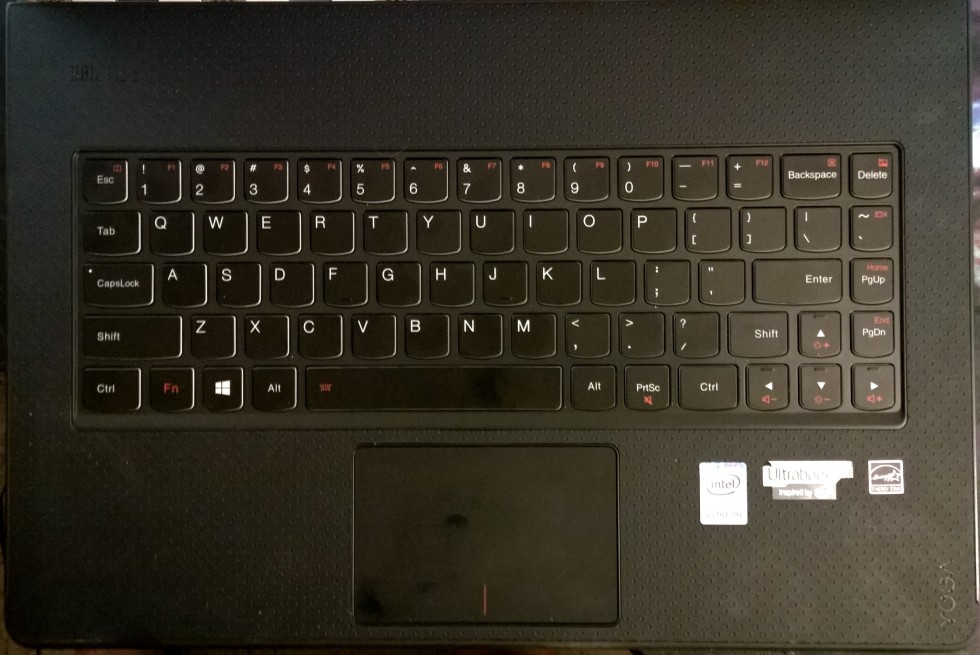 Look at all the space around the keyboard! Is the small trackpad and 5-row keyboard really the best Lenovo can do here?