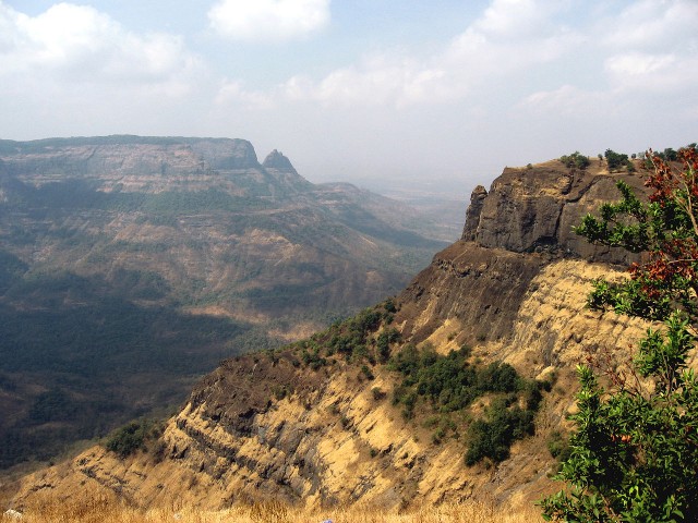 The layered deposits of the Deccan Traps are the product of a series of massive eruptions called flood basalts.