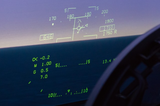 A military aircraft HUD (in this case, from an <a href="http://arstechnica.com/gadgets/2014/12/mach-2-hair-on-fire-ars-flies-the-navys-fa-18-sim-into-the-danger-zone/">F/A-18F simulator)</a> showing dense symbology.