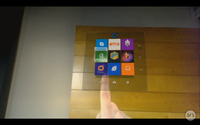 An interface element in Windows Holographic projected on a real-world wall, as seen through the HoloLens.