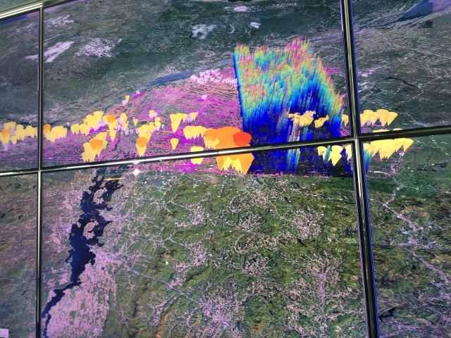 A visualization of analytic data from Hydro Quebec's power grid and weather sensors in GE's Connected Experience Lab. This shows the sites of potential weather-related outages south of the St. Lawrence Seaway.