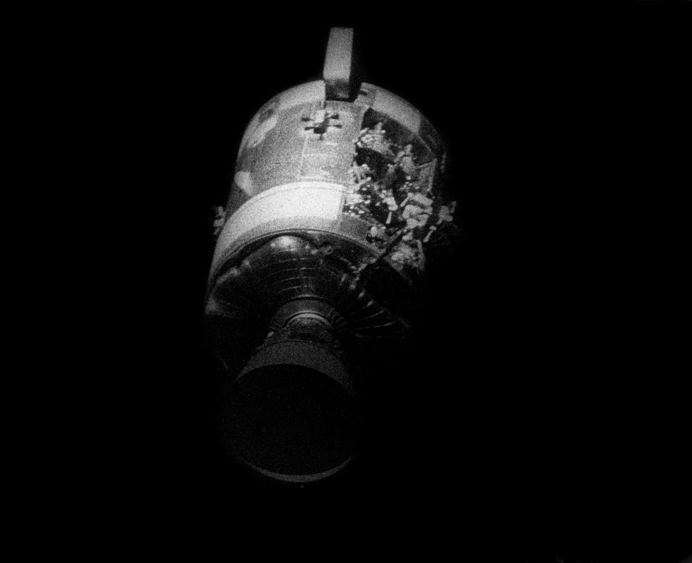 Apollo 13's service module shortly after separation for splashdown. Extensive damage is visible from the oxygen tank explosion.