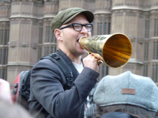 Cory Doctorow protesting against the UK's 2010 Digital Economy Act outside the Houses of Parliament